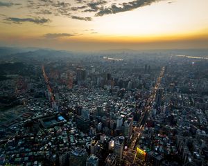 Preview wallpaper city, aerial view, buildings, sunset, overview