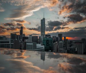 Preview wallpaper city, aerial view, buildings, sunset, reflection