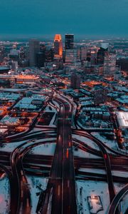 Preview wallpaper city, aerial view, buildings, roads, snow, dusk