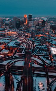 Preview wallpaper city, aerial view, buildings, roads, snow, dusk