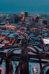 Preview wallpaper city, aerial view, buildings, roads, snow, dusk