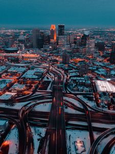 Preview wallpaper city, aerial view, buildings, roads, snow, dusk