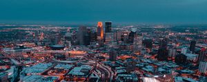 Preview wallpaper city, aerial view, buildings, roads, snow, dusk