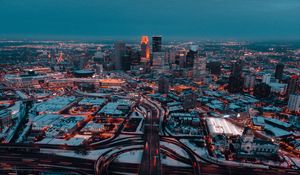 Preview wallpaper city, aerial view, buildings, roads, snow, dusk