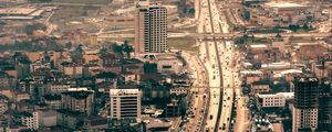 Preview wallpaper city, aerial view, buildings, road, cars