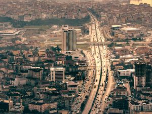 Preview wallpaper city, aerial view, buildings, road, cars