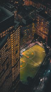 Preview wallpaper city, aerial view, buildings, football ground, night, lights