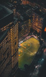 Preview wallpaper city, aerial view, buildings, football ground, night, lights