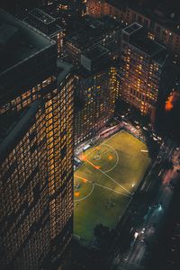 Preview wallpaper city, aerial view, buildings, football ground, night, lights