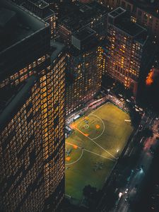 Preview wallpaper city, aerial view, buildings, football ground, night, lights