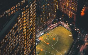 Preview wallpaper city, aerial view, buildings, football ground, night, lights