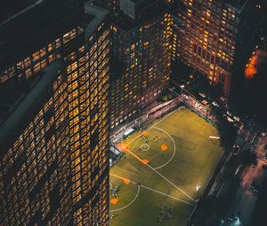 Preview wallpaper city, aerial view, buildings, football ground, night, lights