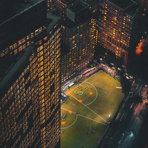Preview wallpaper city, aerial view, buildings, football ground, night, lights