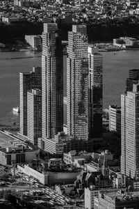 Preview wallpaper city, aerial view, buildings, pier, water, bw