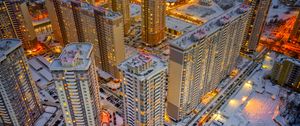 Preview wallpaper city, aerial view, buildings, twilight, snow, winter