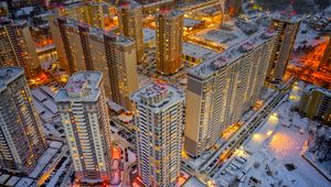 Preview wallpaper city, aerial view, buildings, twilight, snow, winter