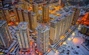 Preview wallpaper city, aerial view, buildings, twilight, snow, winter