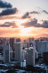 Preview wallpaper city, aerial view, buildings, sunset
