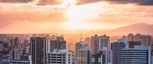 Preview wallpaper city, aerial view, buildings, sunset