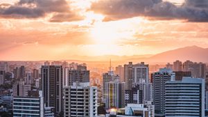 Preview wallpaper city, aerial view, buildings, sunset