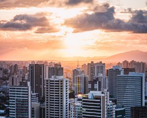 Preview wallpaper city, aerial view, buildings, sunset