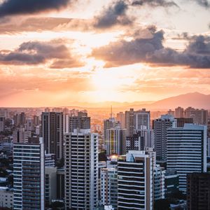 Preview wallpaper city, aerial view, buildings, sunset