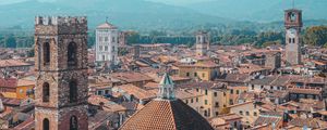 Preview wallpaper city, aerial view, buildings, towers, roofs, architecture