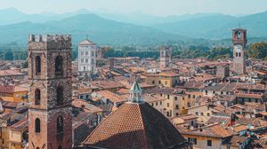 Preview wallpaper city, aerial view, buildings, towers, roofs, architecture