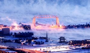 Preview wallpaper city, aerial view, buildings, road, bridge, snow, storm