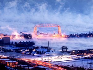 Preview wallpaper city, aerial view, buildings, road, bridge, snow, storm