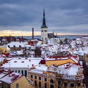 Preview wallpaper city, aerial view, buildings, cityscape, snow, winter