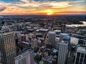 Preview wallpaper city, aerial view, buildings, cityscape, sunset