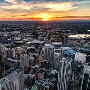 Preview wallpaper city, aerial view, buildings, cityscape, sunset