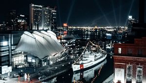 Preview wallpaper city, aerial view, buildings, ship, pier, night, lights