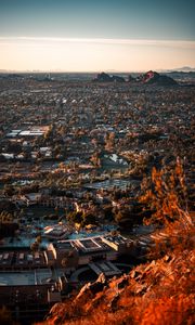 Preview wallpaper city, aerial view, buildings, trees, mountains, cityscape