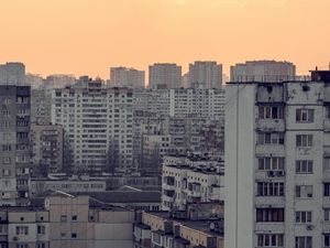 Preview wallpaper city, aerial view, buildings, skyscrapers, sunset