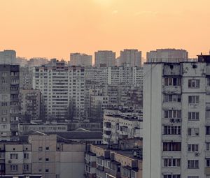 Preview wallpaper city, aerial view, buildings, skyscrapers, sunset