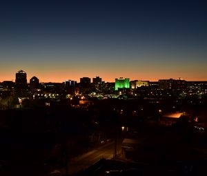 Preview wallpaper city, aerial view, buildings, lights, twilight, dark