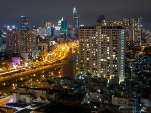 Preview wallpaper city, aerial view, buildings, road, lights