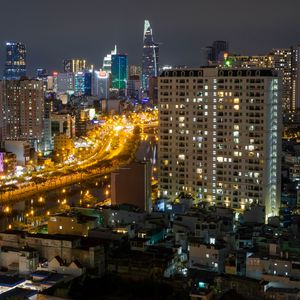 Preview wallpaper city, aerial view, buildings, road, lights