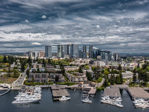 Preview wallpaper city, aerial view, buildings, coast, boats
