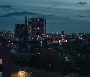 Preview wallpaper city, aerial view, buildings, road, trees, twilight