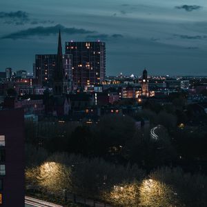 Preview wallpaper city, aerial view, buildings, road, trees, twilight