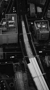 Preview wallpaper city, aerial view, buildings, road, black and white