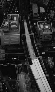 Preview wallpaper city, aerial view, buildings, road, black and white