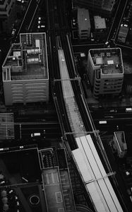 Preview wallpaper city, aerial view, buildings, road, black and white