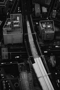 Preview wallpaper city, aerial view, buildings, road, black and white