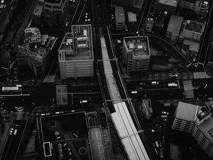 Preview wallpaper city, aerial view, buildings, road, black and white