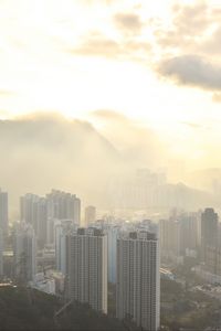 Preview wallpaper city, aerial view, buildings, fog, light