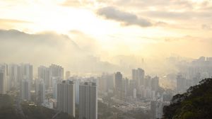 Preview wallpaper city, aerial view, buildings, fog, light